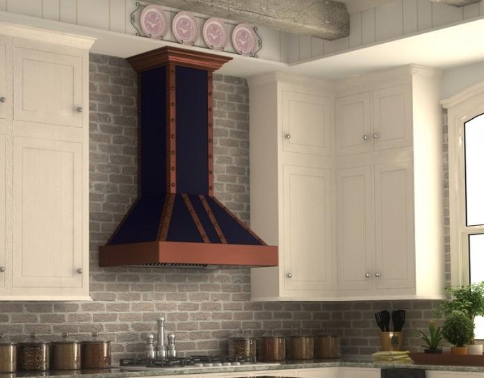 a kitchen with freestanding vented range hood